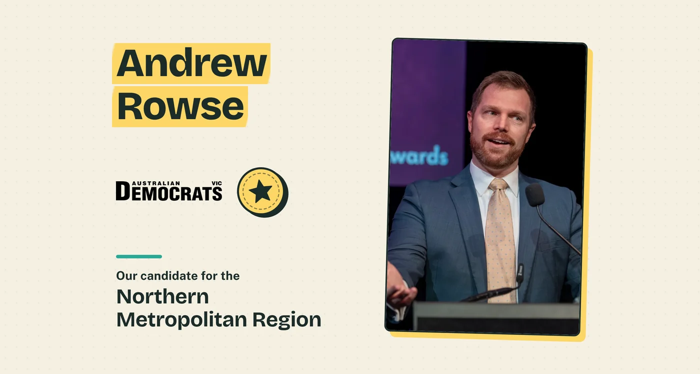 Andrew Rowse speaking at a lectern at an awards night, beside the name Andrew Rowse and the words 'Our candidate for the Northern Metropolitan Region', with the Australian Democrats Victoria logo
